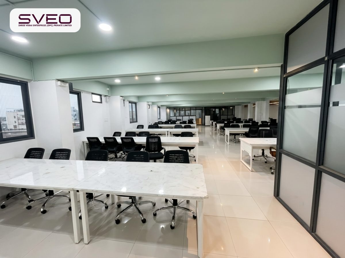 Open training and collaboration space with rows of desks at SVEO